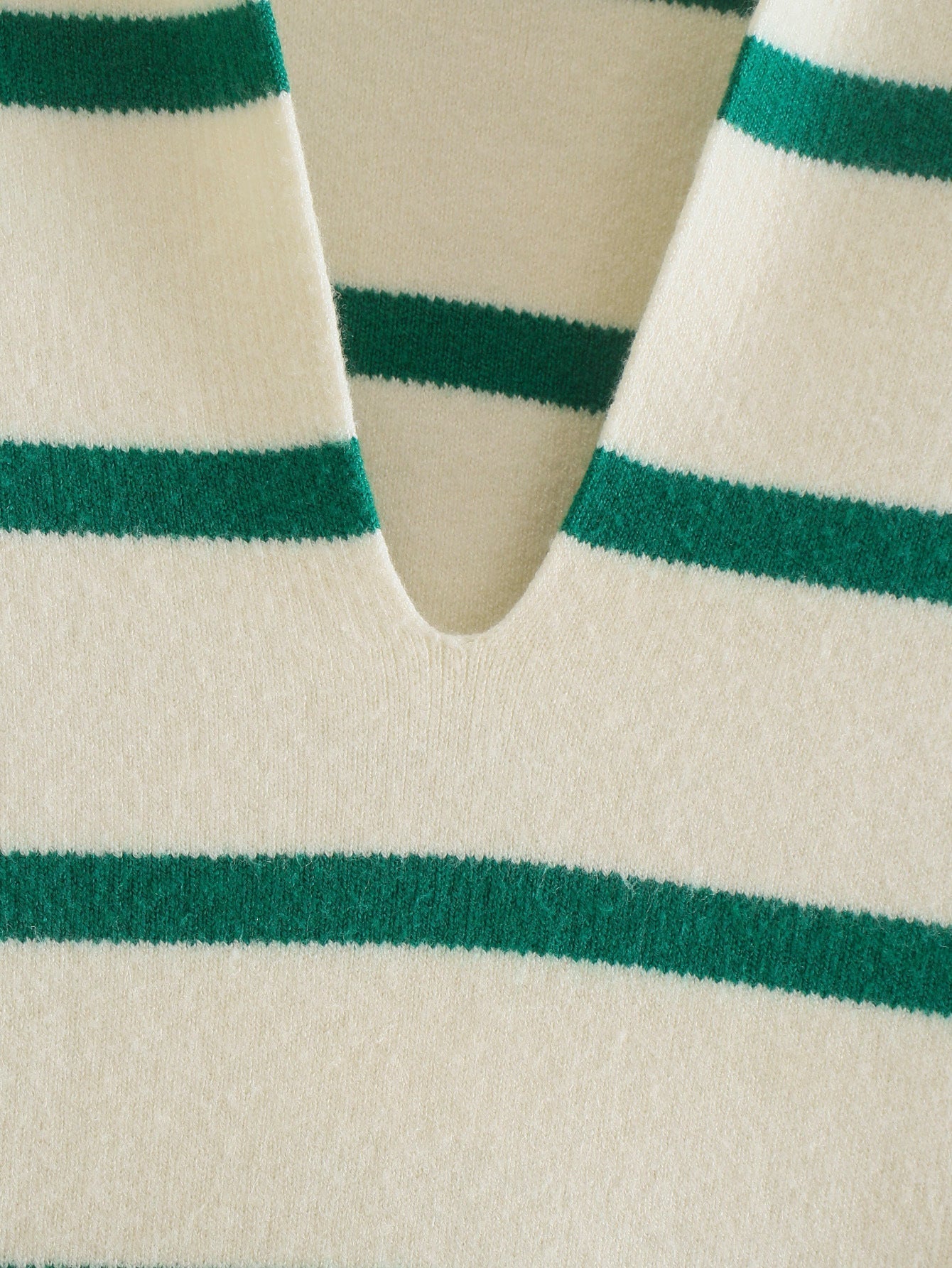 A Vintage Style Sweater with Delicate Timeless Details