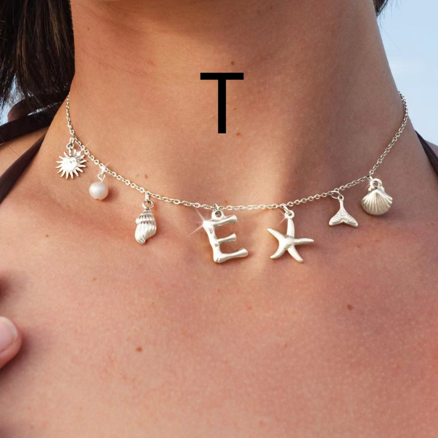 Silver letter T
