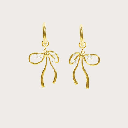 A Pair Of Gold Earrings