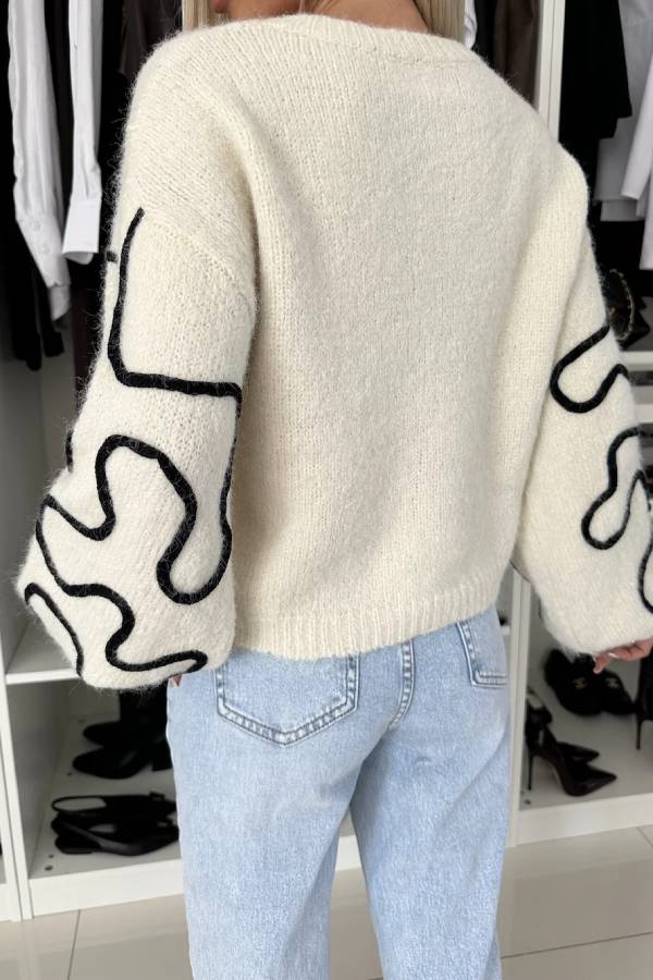A Vintage Style Sweater with Delicate Timeless Details