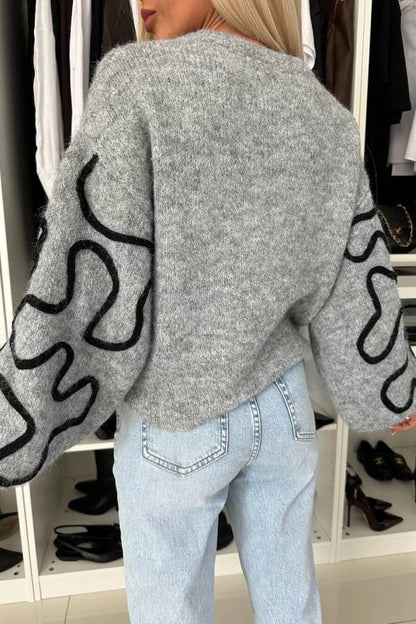 A Vintage Style Sweater with Delicate Timeless Details