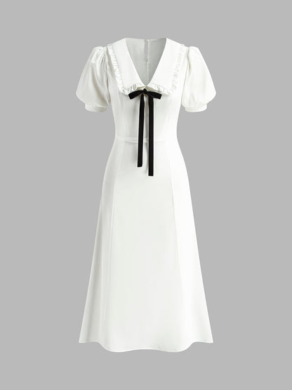 Beautifully Finished Dress in a Timeless Design