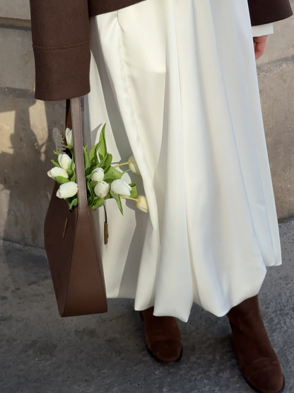 Well Tailored Garment with a Graceful Silhouette