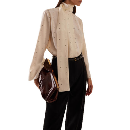 Well Tailored Top with a Graceful Silhouette