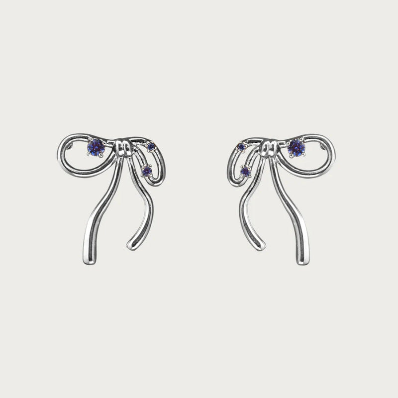 A Pair Of Silver Ear Studs