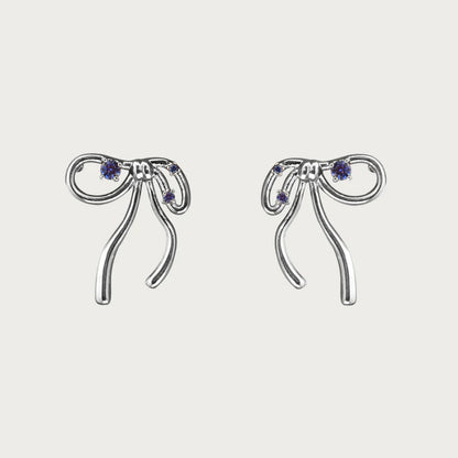 A Pair Of Silver Ear Studs