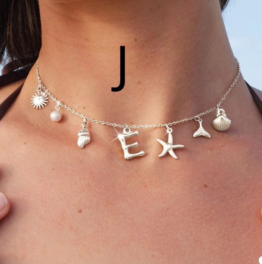 Silver letter J
