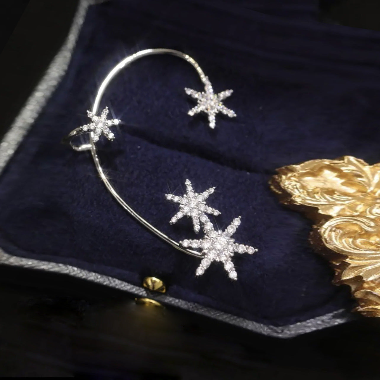 Silver snowflake right ear