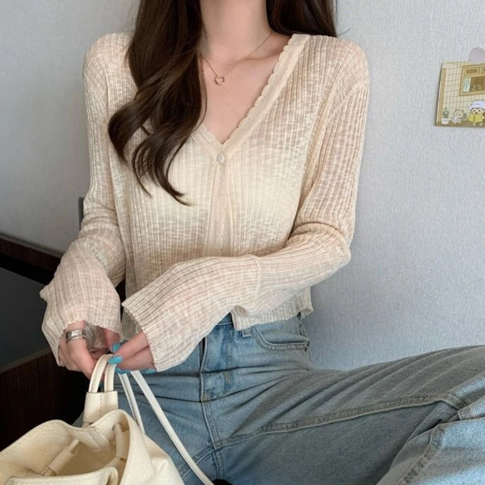 A Vintage Style Cardigan with Delicate Timeless Details