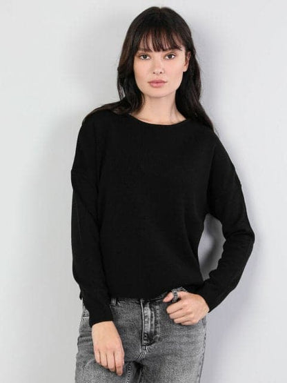 A Vintage Style Sweater with Delicate Timeless Details