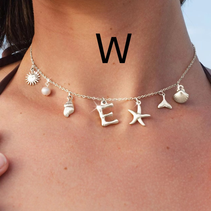 Silver letter W