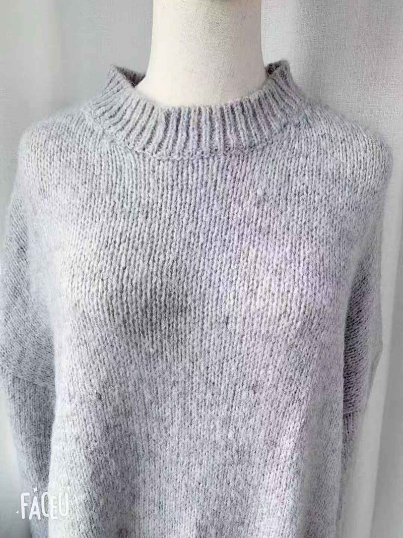A Vintage Style Sweater with Delicate Timeless Details