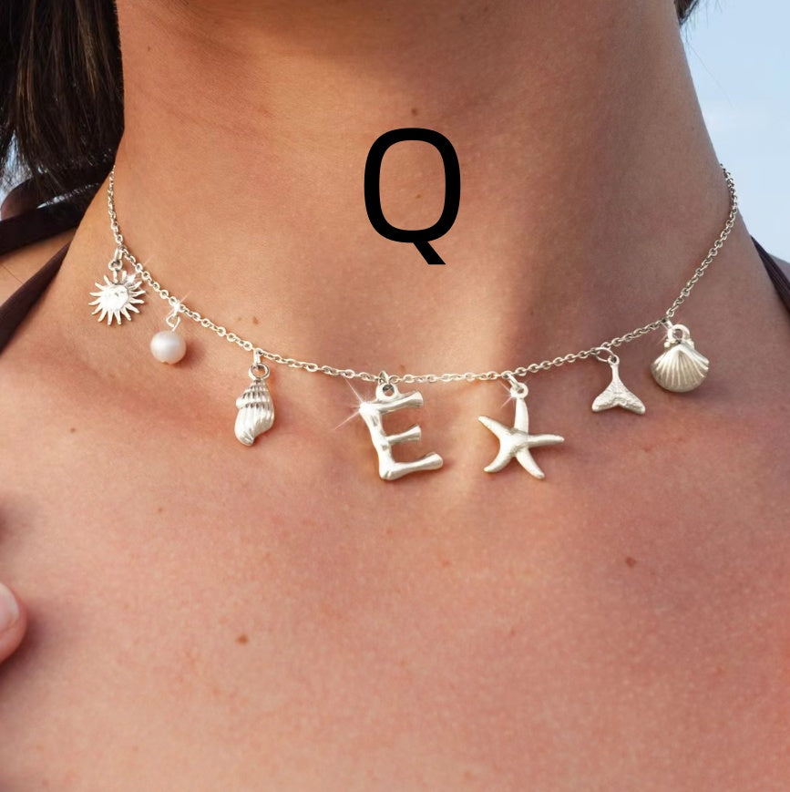 Silver letter Q