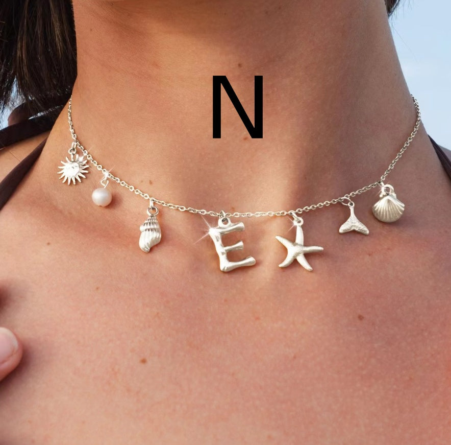 Silver letter N