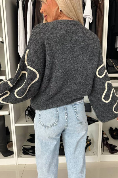 A Vintage Style Sweater with Delicate Timeless Details