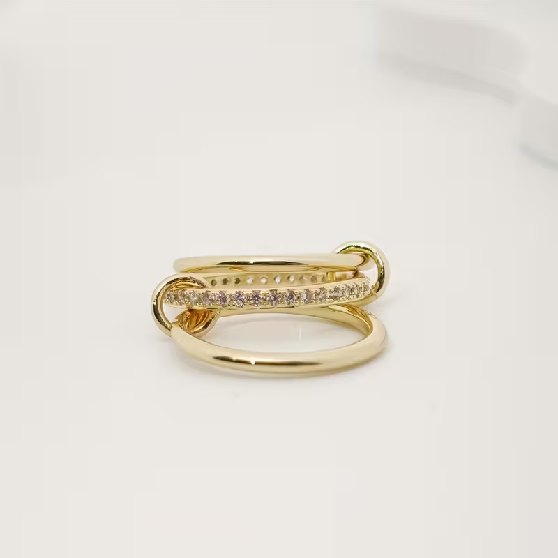 Intertwined Trinity Ring